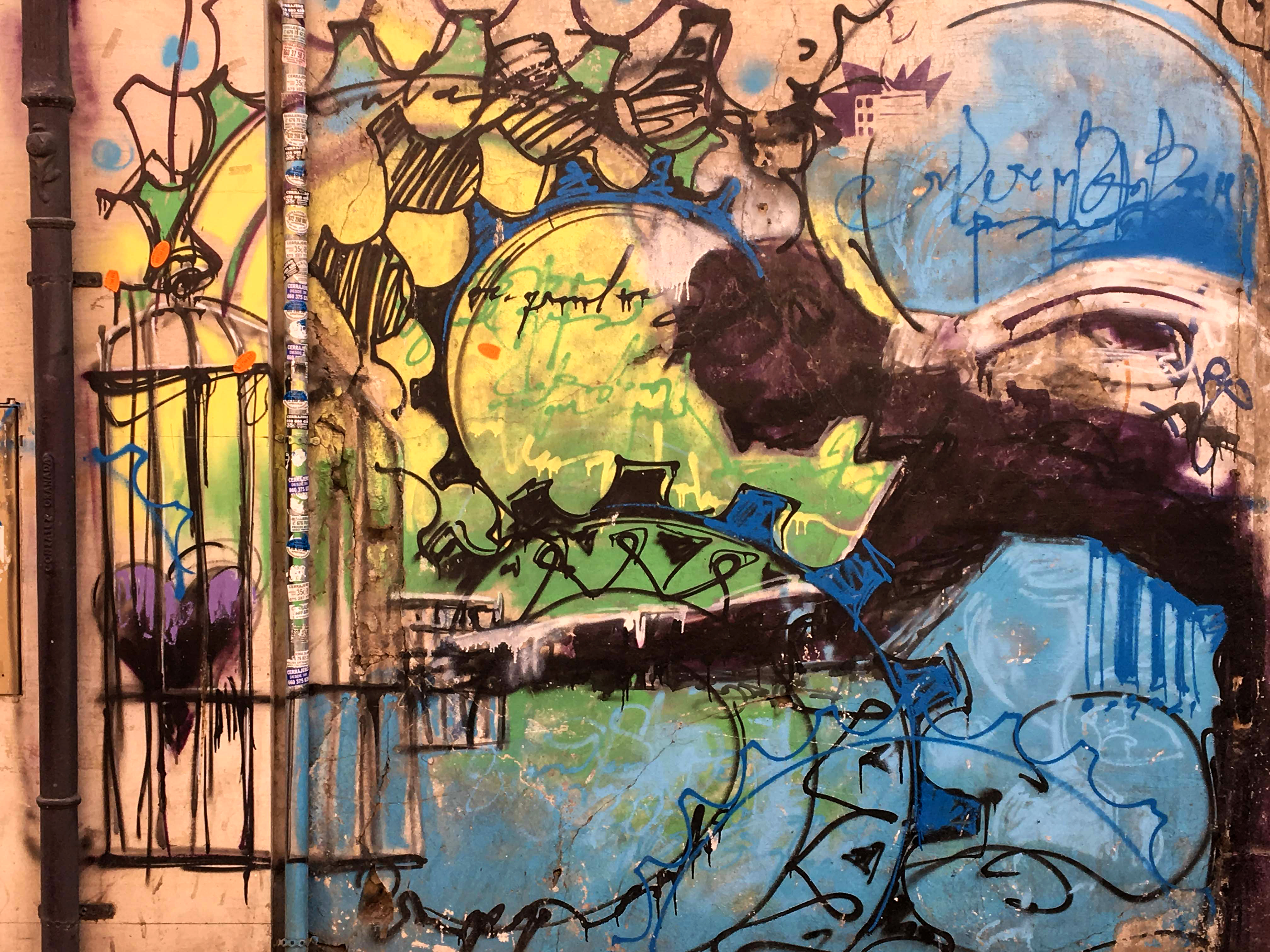 Ausschnitt aus einem Mural von El Niño de las Pinturas dass einen Mann mit einem Vogelkäfig zeigt