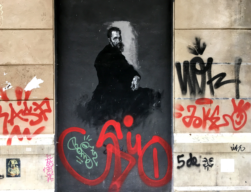 das Portrait eines älteren Herren mit roten Graffiti