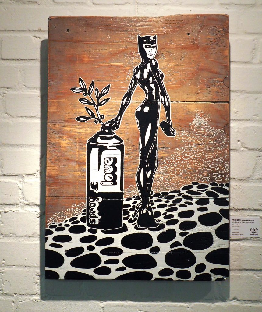 Katzenfrau mit Sprühdose